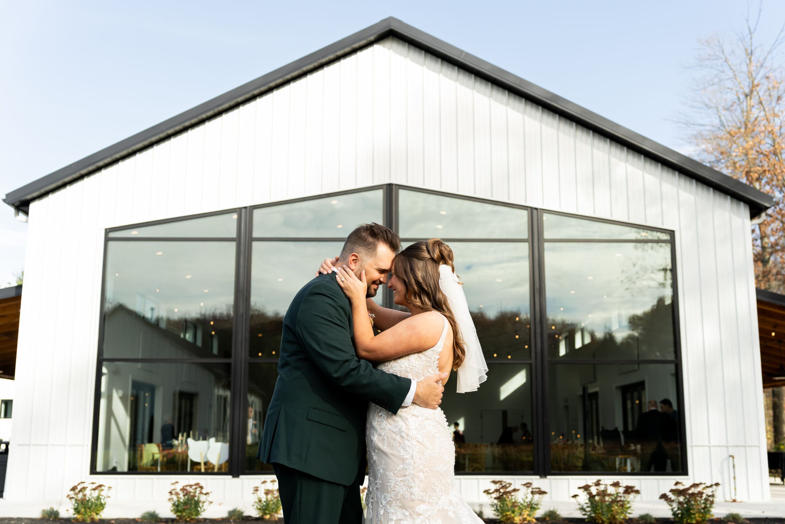 couples wedding portrait in front of The Wellspring wedding venue in Ohio